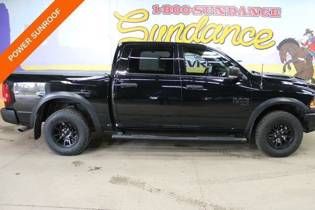 2021 RAM 1500 Classic SLT in Diamond Black C — front three-quarter view