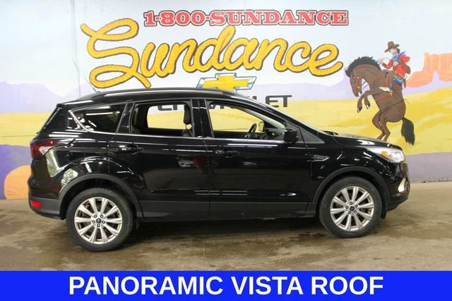2019 Ford Escape SEL in Black — front three-quarter view