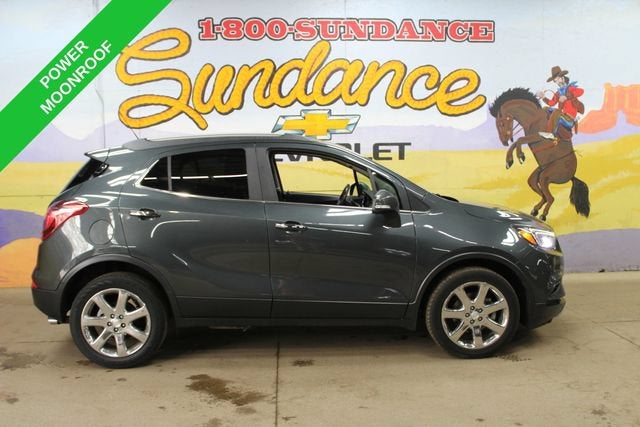 2018 Buick Encore Essence in Includes (Cm5) Black Carbon Metallic Lower Exterior Accent Color, Paint Code W700s. — front three-quarter view