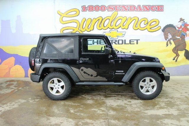 2015 Jeep Wrangler Sport in Black — front three-quarter view