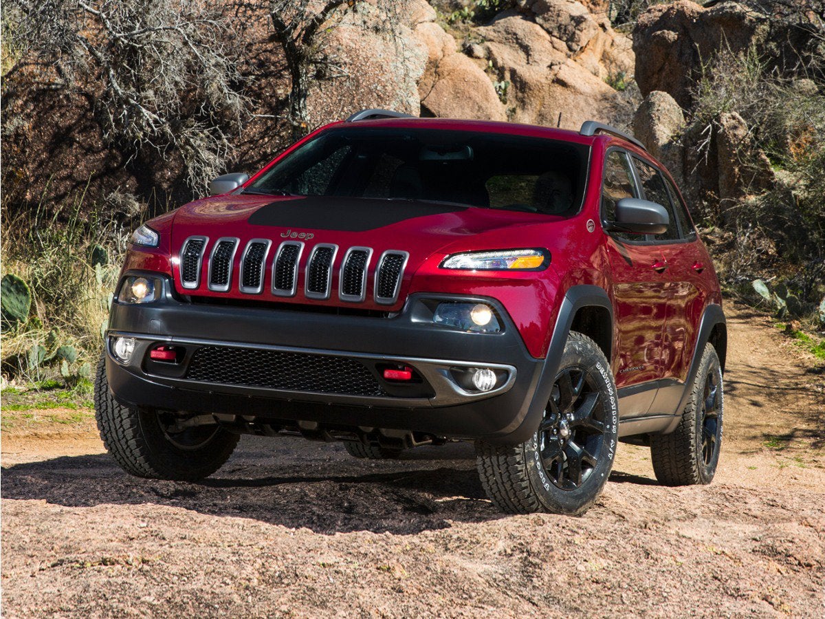2016 Jeep Cherokee Trailhawk in Red — front three-quarter view
