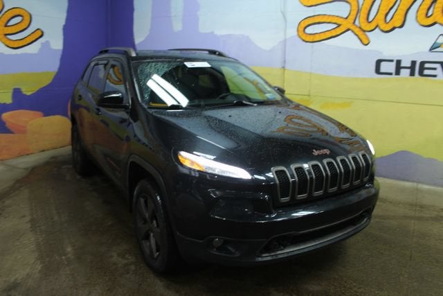 2016 Jeep Cherokee — rear three-quarter view