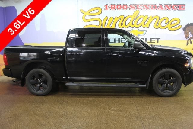 2019 RAM 1500 Classic SLT in Diamond Black C — front three-quarter view