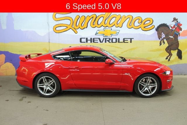 2018 Ford Mustang GT in Race Red — front three-quarter view