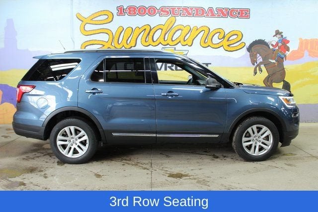 2019 Ford Explorer XLT in Blue — front three-quarter view