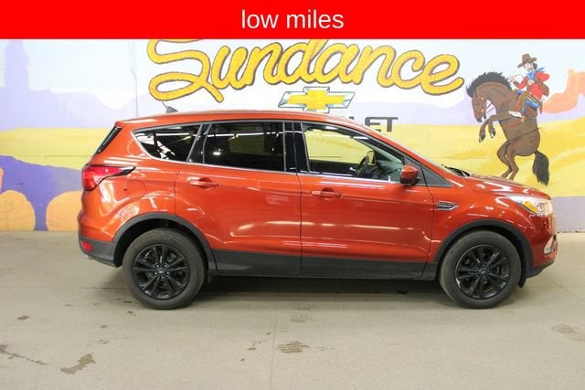 2019 Ford Escape SE in Orange — front three-quarter view