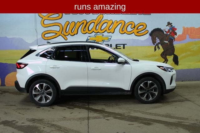 2024 Ford Escape Platinum in White — front three-quarter view