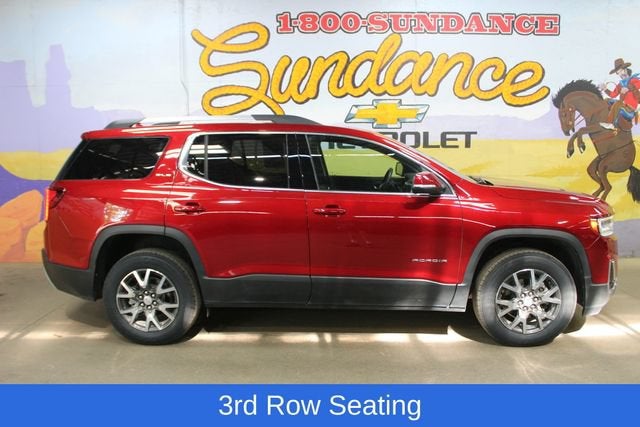 2023 GMC Acadia SLE in Volcanic Red Tintcoat — front three-quarter view