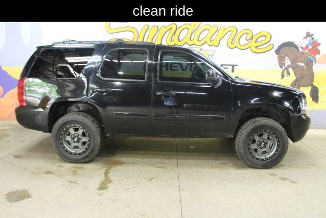 2012 Chevrolet Tahoe LT in Black — front three-quarter view
