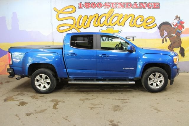 2018 GMC Canyon 4WD SLE in Blue — front three-quarter view