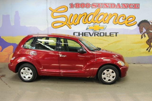 2009 Chrysler PT Cruiser 4DR BASE in Inferno Red Cryst — front three-quarter view