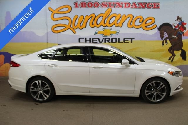 2017 Ford Fusion Titanium in White Platinum — front three-quarter view