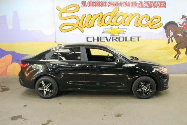 2023 Kia Rio LX in Black — front three-quarter view