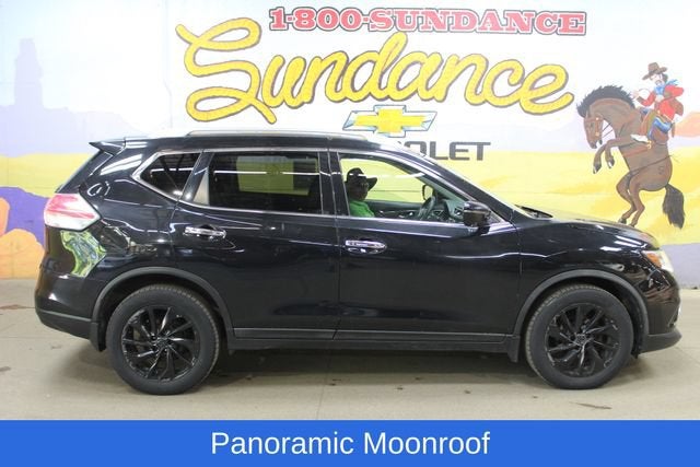 2016 Nissan Rogue SV in Black — front three-quarter view