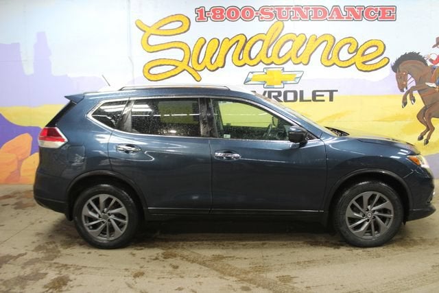2016 Nissan Rogue SV in Blue — front three-quarter view