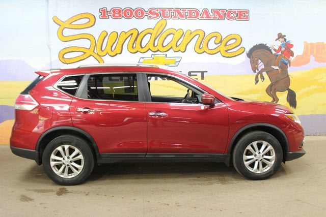 2015 Nissan Rogue S in Red — front three-quarter view