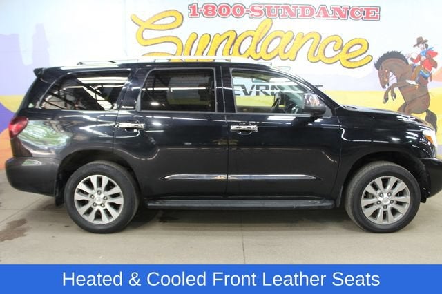 2018 Toyota Sequoia Platinum in Midnight Black — front three-quarter view