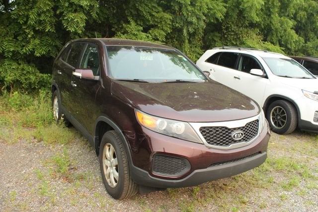 2013 Kia Sorento LX in Dark Cherry — front three-quarter view