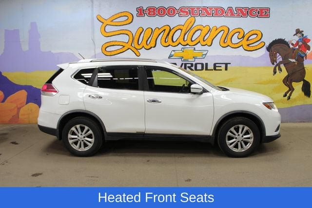 2016 Nissan Rogue SV in White — front three-quarter view