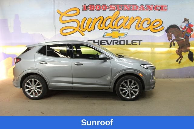 2024 Buick Encore GX Avenir in Moonstone Gray Metallic — front three-quarter view