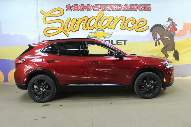 2023 Buick Envision Preferred in Cinnabar Metallic — front three-quarter view
