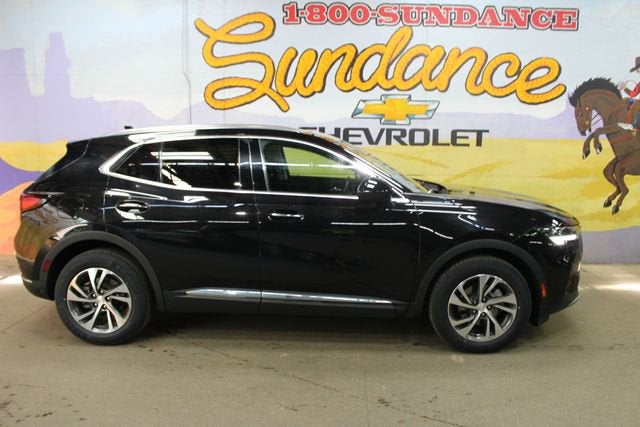 2021 Buick Envision Essence in Ebony Twilight Metallic — front three-quarter view