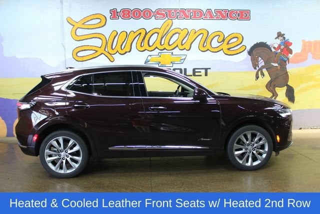2023 Buick Envision Avenir in Rich Garnet Metallic — front three-quarter view