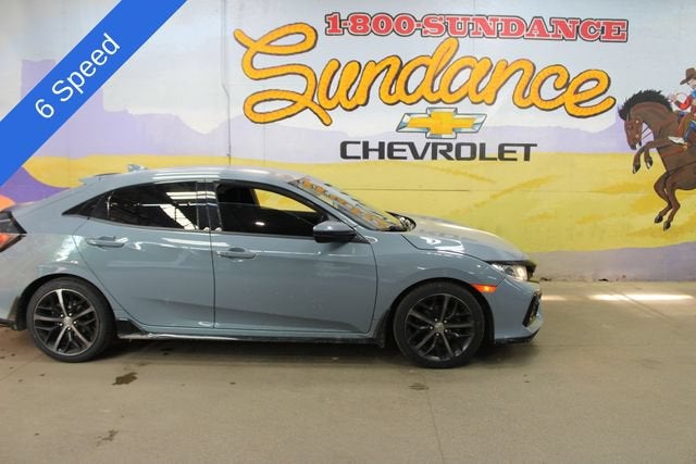 2020 Honda Civic Hatchback Sport in Gray — front three-quarter view